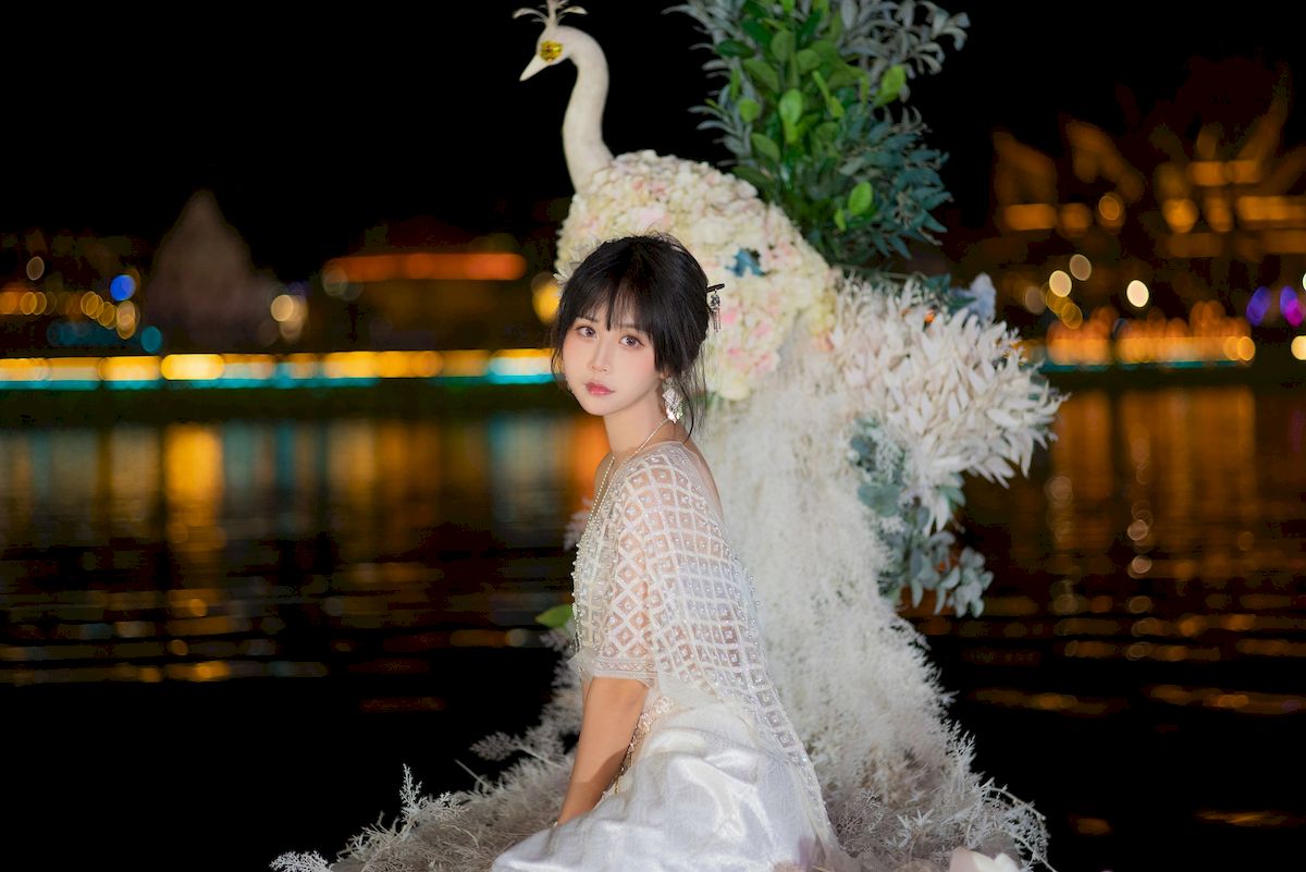 萌芽儿o0西双版纳傣族服饰户外写真